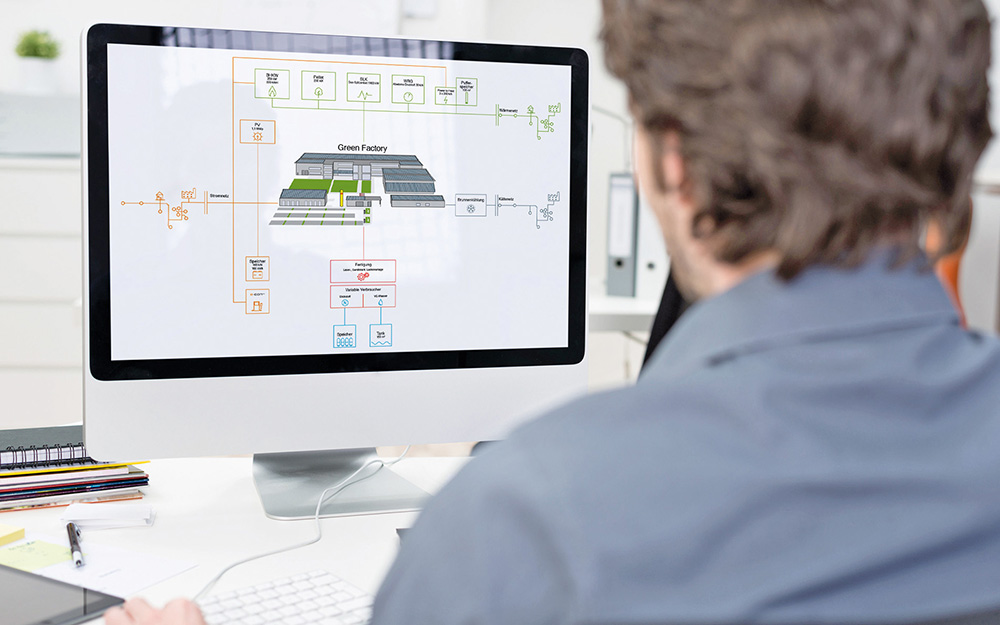 Image of planning. Engineer in front of computer monitor.